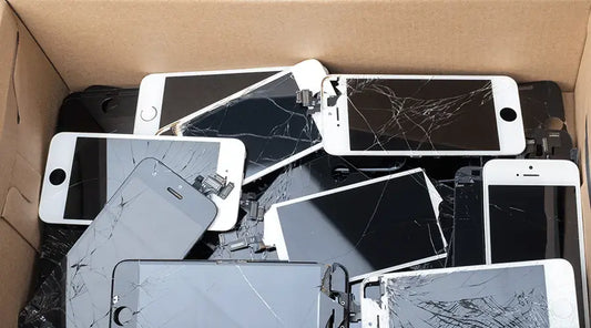 A person meets a buyer while selling a used smartphone.