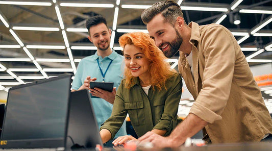 Customer bringing a smartphone to PayMore Sand Lake.