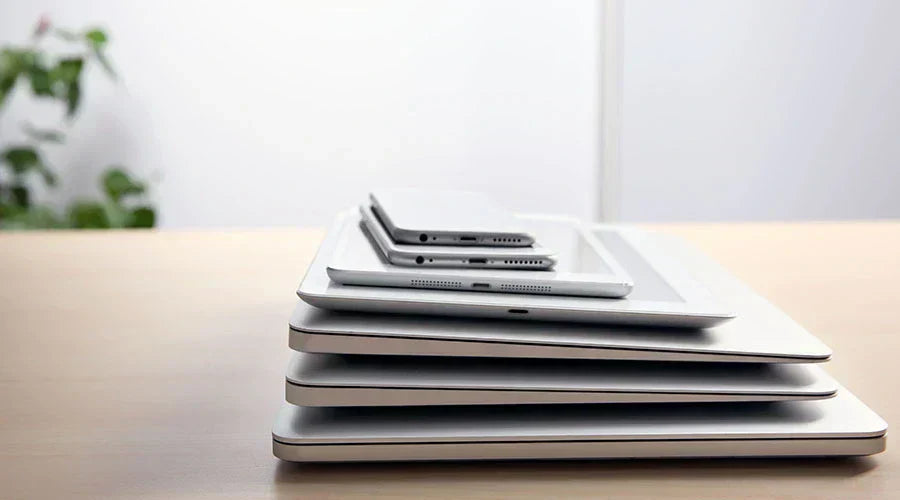 Stack of used smartphones collected at PayMore Sand Lake